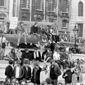 Anti-nuclear demonstration in Trafalgar Square, London. One placard reads: Scrap Polaris