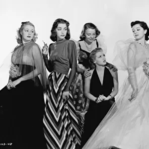 An array of Dolly Tree gowns in These Glamour Girls (1939)