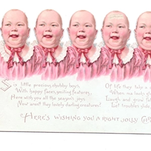 Six babies in pink on a cutout Christmas card