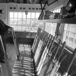 Bala Lake Railway guard Bob Davies operates the signal box