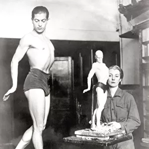 Ballet dancer poses for sculptor, Paris, 1933