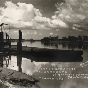 Barges on the bank of the Panuco River, Mexico