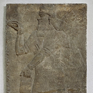 Bas relief Assyrian Genie. 9th century BC. Archeological Mus