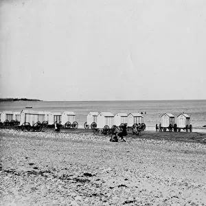 Bathing huts on the beach at Colwyn Bay, North Wales