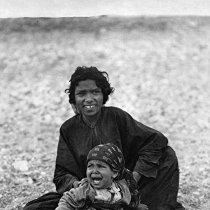 Bedouin woman and child, Holy Land