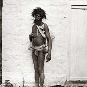 Beggar in rags, India, circa 1880s