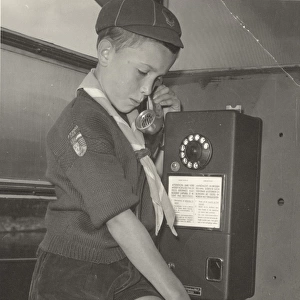 Belgian boy scout in phone box