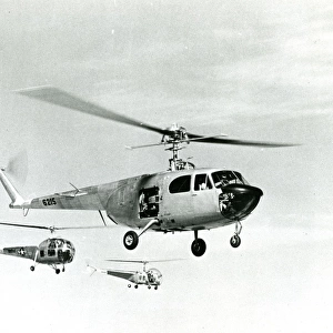 Bell Model 48 XR-12, 46-215, in the foreground, Bell XH-?