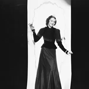 Betty Furness in a smart evening ensemble by Dolly Tree