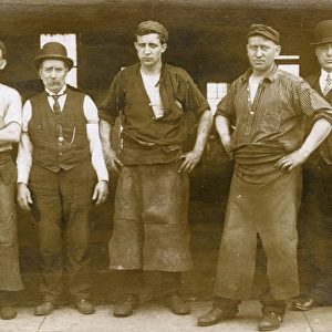 Blacksmiths outside their foundry or forge, USA