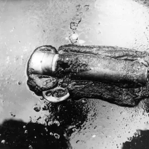 Blitz in London -- burnt-out incendiary device, WW2