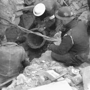 Blitz in London -- rescue workers searching debris, WW2