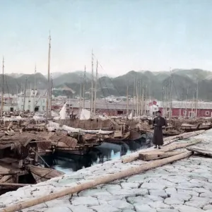 Boats tied up in Kobe harbour, Japan, circa 1890. Date: circa 1890 Boats tied up in Kobe harbour, Japan, circa 1890. Date: circa 1890