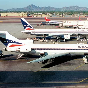 Boeing 727-232 N512DA (msn 21314, line Number 1358). of Delta Airlines at Las Vegas International Airport, with Delta 757 N614DL. Date: circa 1996