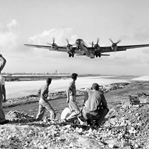 Boeing B-29 (forward view) climbing out of Saipan, Dec