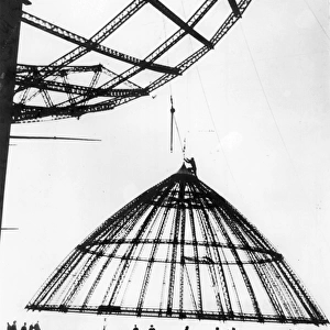 The bow framework of Graf Zeppelin II LZ 130 being lifted