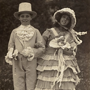 Boy and girl in historical fancy dress costume