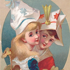 Boy and girl in paper hats on a Christmas card