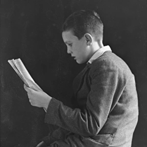 Boy reading, photographic portrait 1936