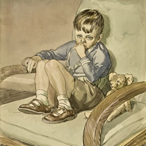 Boy sitting with his teddy bear