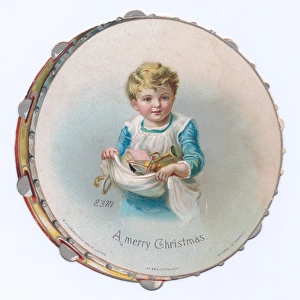 Boy on a tambourine-shaped Christmas card