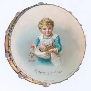 Boy on a tambourine-shaped Christmas card