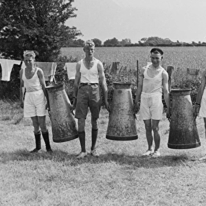 Boys Club, carrying milk churns 1935