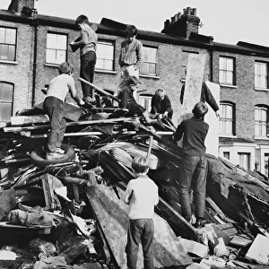 Boys on a pile of rubbish, Balham, SW London
