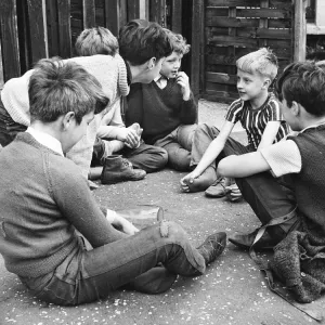 Boys playing with bottle, Balham, SW London