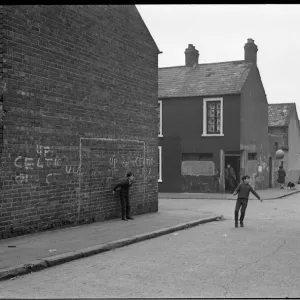 Boys playing football, Belfast, Northern Ireland