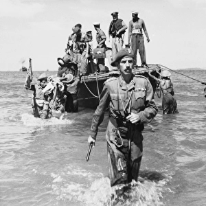 Brigadier Cotterill-Hill wades ashore - Burma