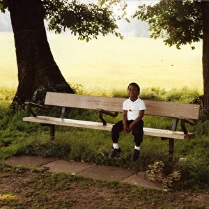 British Caribbean Heritage - Boy on the bench Hampstead Lond