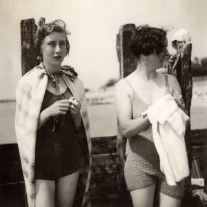 British Seaside Scene - Two woemn dry off after dip in sea