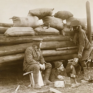 British soldiers resting behind a barricade on Continent