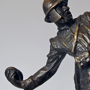 Bronze figure of an Italian bomber wearing Farina helme