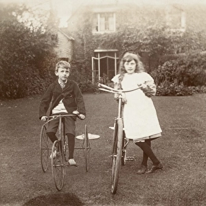 Brother and Sister with their cycles