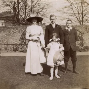 Brothers and sisters in garden, Ealing, West London