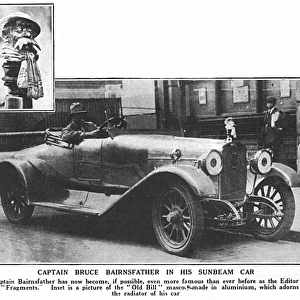 Bruce Bairnsfather in his Sunbeam with Old Bill mascot