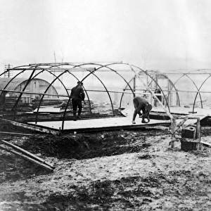Building Nissen huts for troops, Western Front, WW1