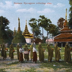 Burmese monks (hpongyees) collecting alms, Burma