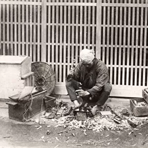 c. 1880s Japan - carpenter with tools at work