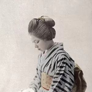 c. 1880s Japan - geisha reading a book