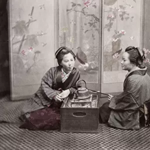 c. 1880s Japan - geishas with a kettle and stove