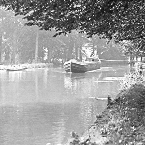 Canal boat drawn by horse