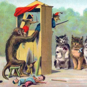 Cats watching a puppet show on a postcard