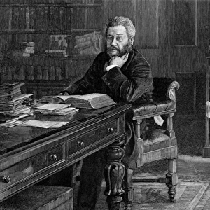 Charles Hadden Spurgeon (at desk)