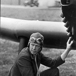 Charles A Lindbergh inspects his Miles M12 Mohawk G-AEKW