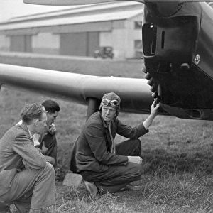 Charles A Lindbergh inspects his Miles M12 Mohawk G-AEKW