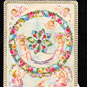 Cherubs with flowers on a Christmas and New Year card