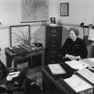 Chief Superintendent Winifred Barker in her office